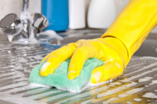 Cleaner maintaining a shared office kitchen in TW9